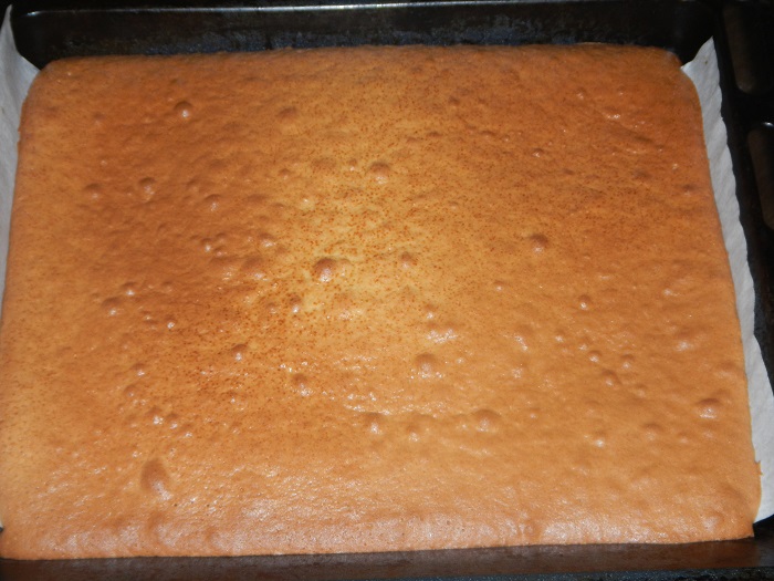 Honey cake with sour cream with condensed milk and nuts