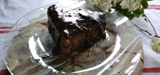 Jewish cake with cherries, nuts and chocolate icing