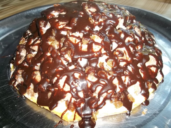 Homemade Pancho cake with sour cream and raisins