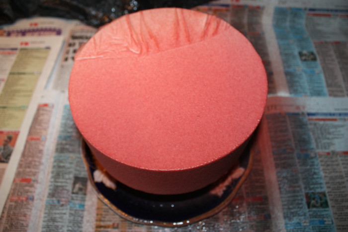 Mousse-biscuit cake with different fillings, covered with velours and glazing