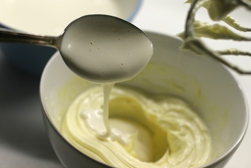 add cream of eggs and sugar to whipped butter
